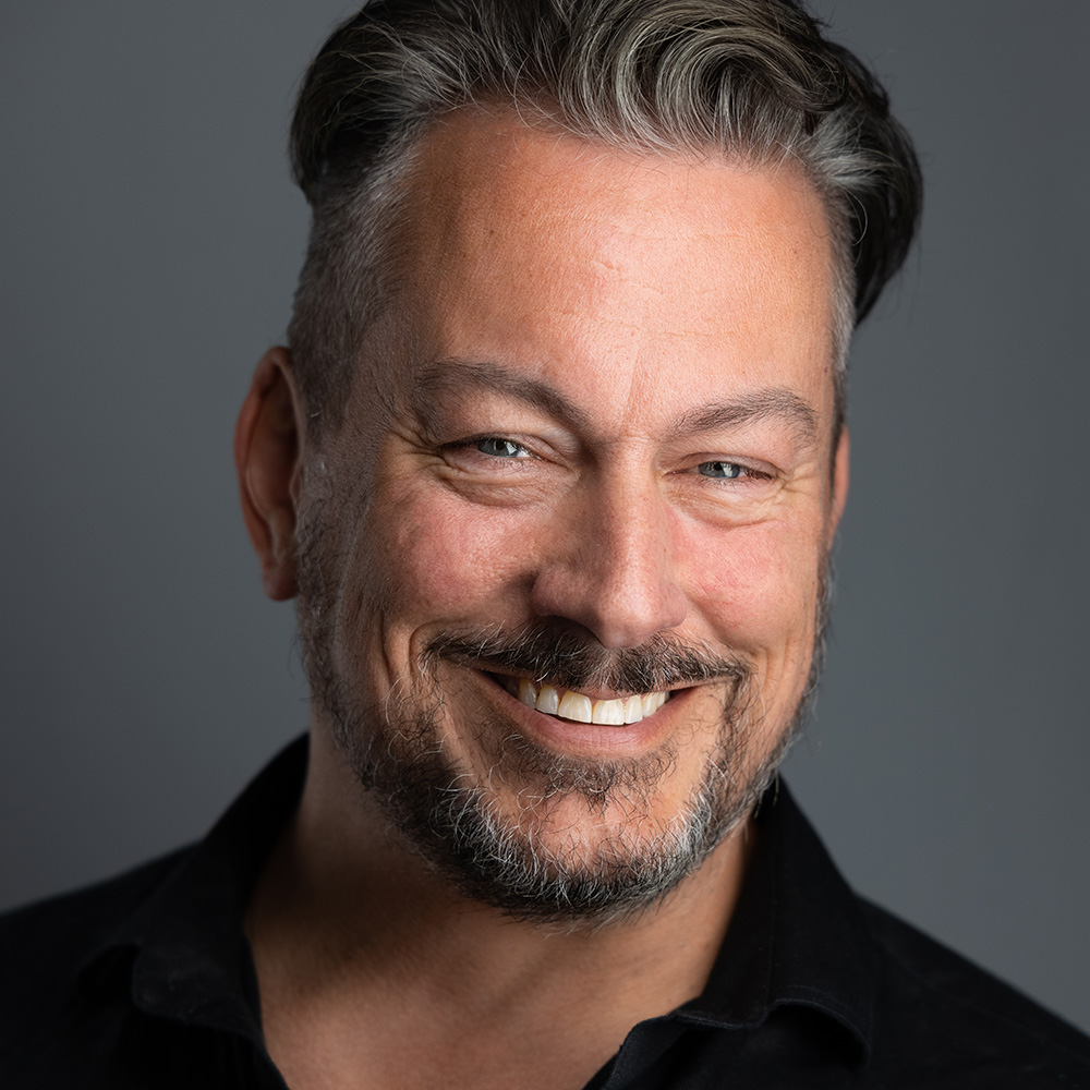 Peter Szpakowski, founder + photographer of 2mm Headshots and Event Photography in North Richland Hills, TX — Hurley-trained, 20+ years experience, 30,000+ people photographed