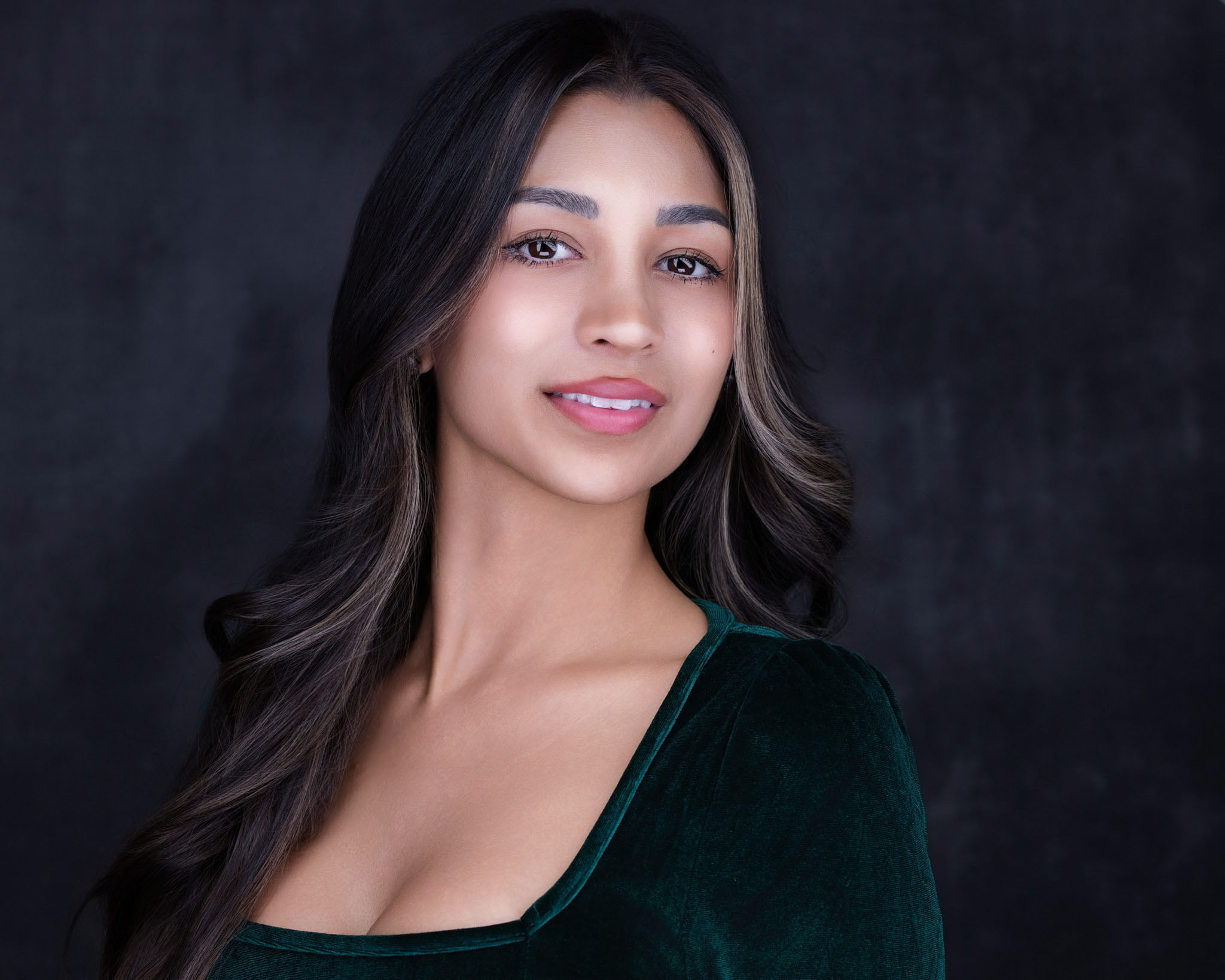 Headshot of a young lady - 2MM Headshots and Event Photography Clean, camera-ready model headshot against a neutral studio background