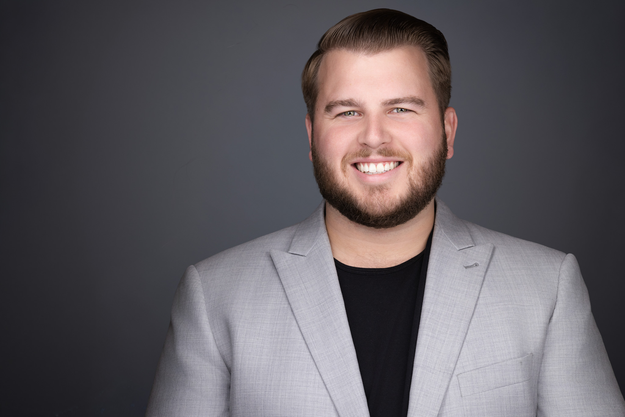 Onsite commercial headshot lighting setup in Keller office
