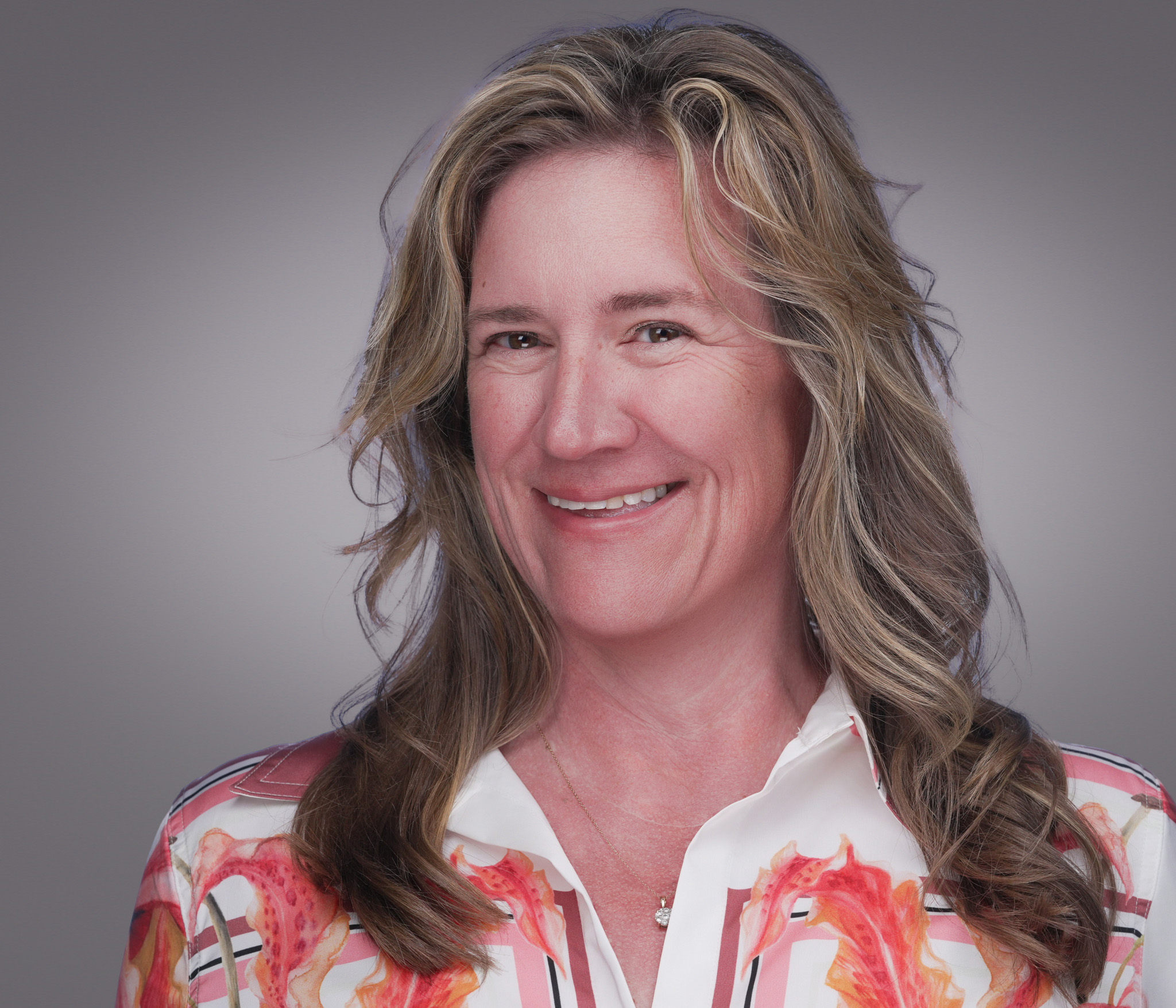 Professional portrait composed for speaker marketing use, photographed in DFW by 2mm Headshots