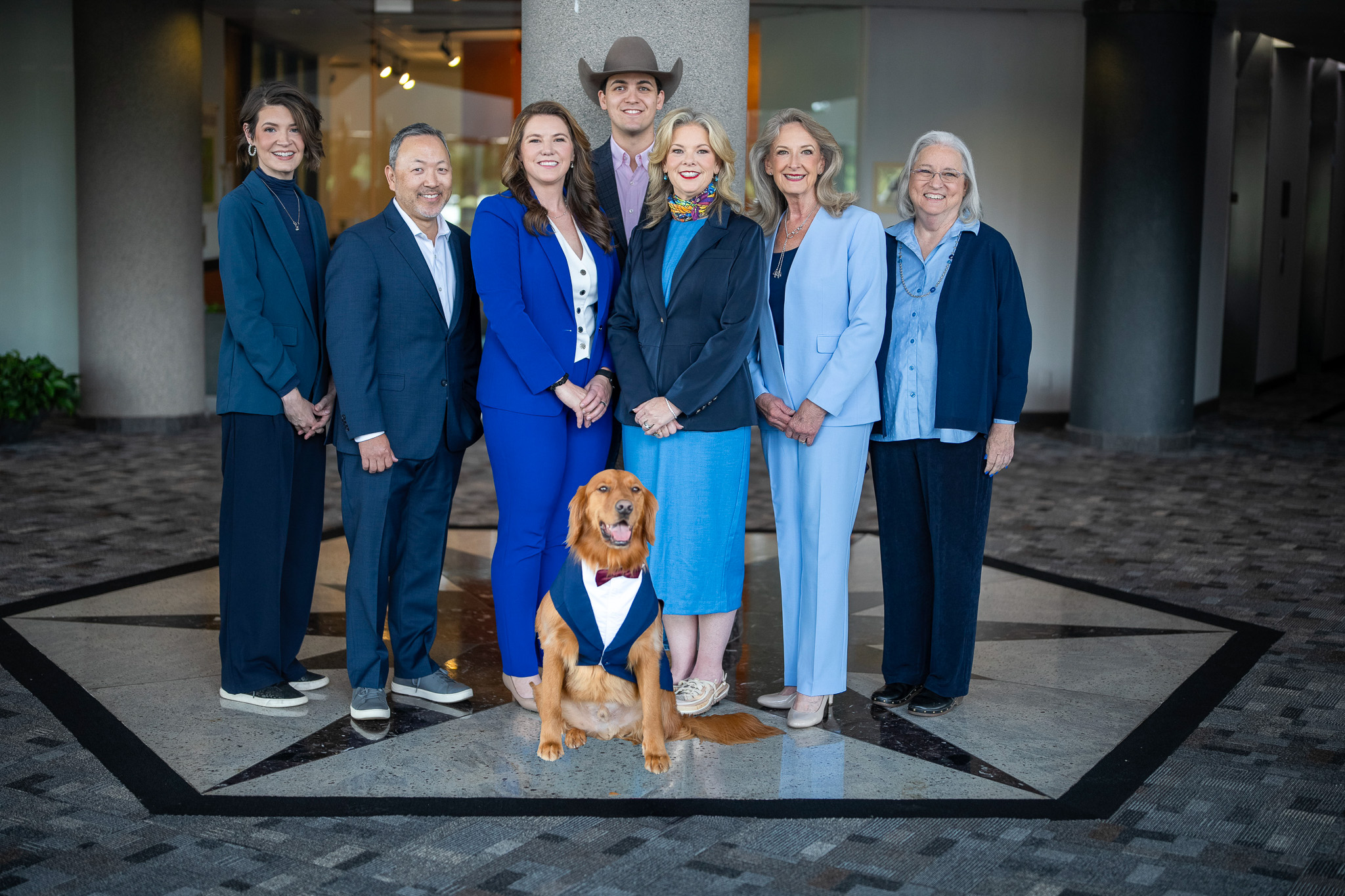 Environmental portrait of a professional meeting with a client in a DFW office, photographed during a lifestyle branding session by 2mm Headshots