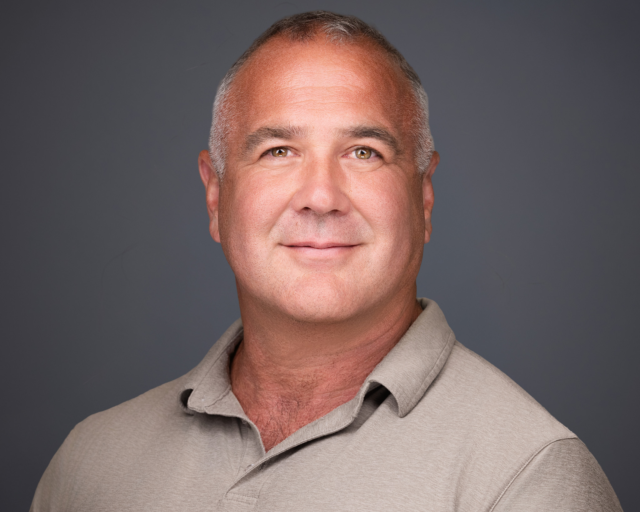 Corporate leader headshot for a Caterpillar or Conduent professional in Lewisville, TX by 2mm Headshots