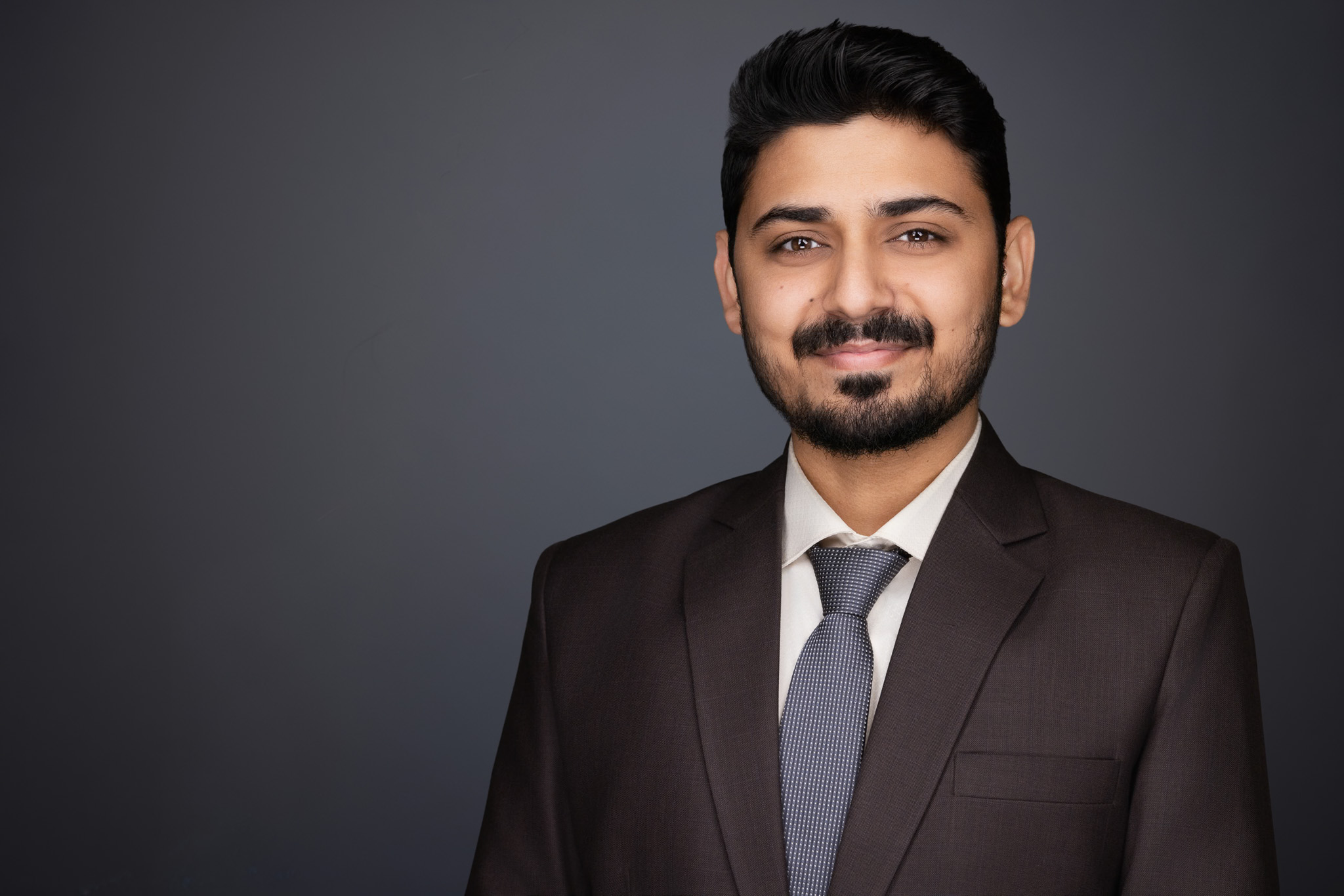Diverse C-Suite Leadership Bench Portrait — DFW Fortune 500 Standard - 2mm Headshots and Event Photography Diverse C-suite leadership bench portrait