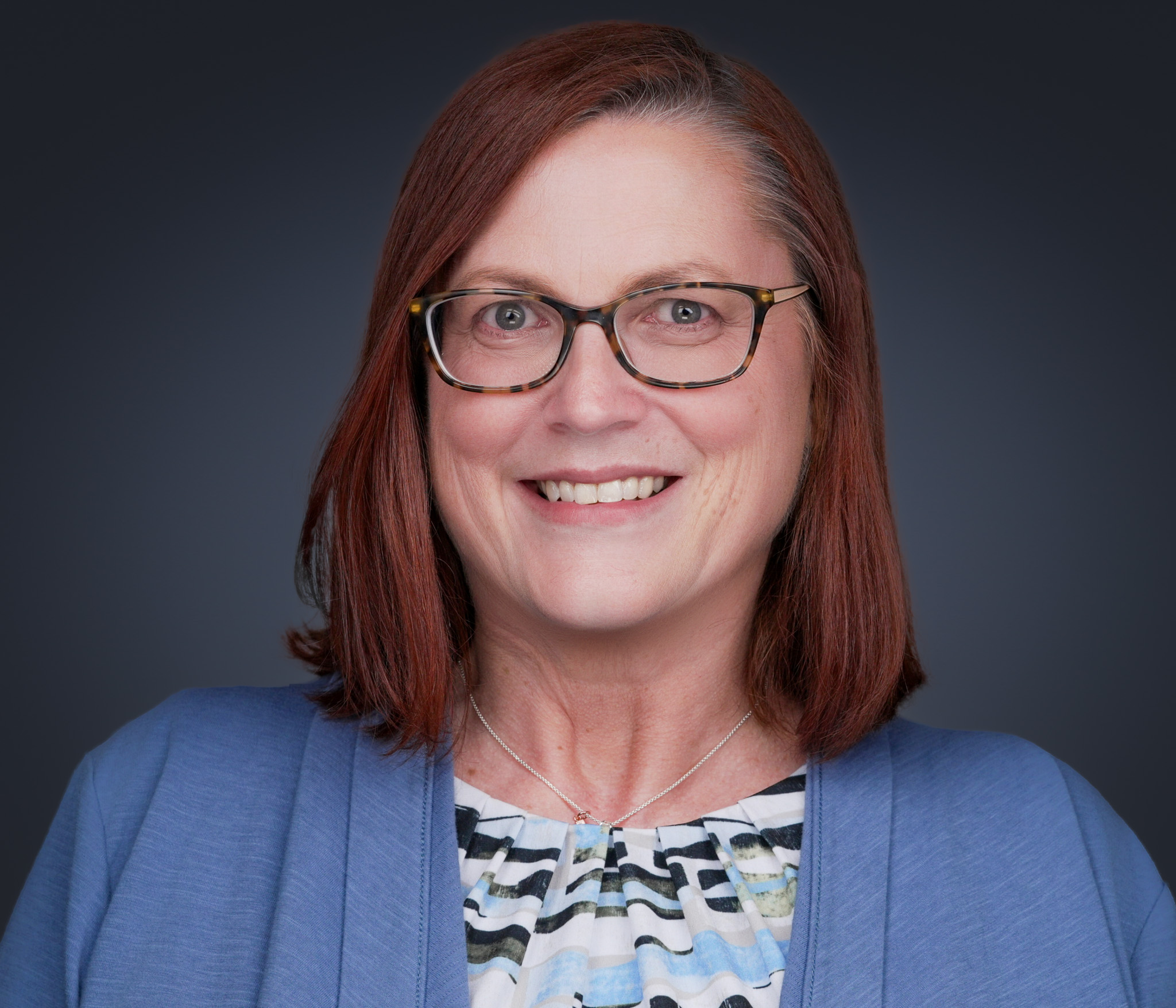 DFW physician portrait finished to match Texas Health Resources, Baylor Scott & White, Methodist, Cook Children's, and UT Southwestern provider-directory bio-page templates by 2mm Headshots