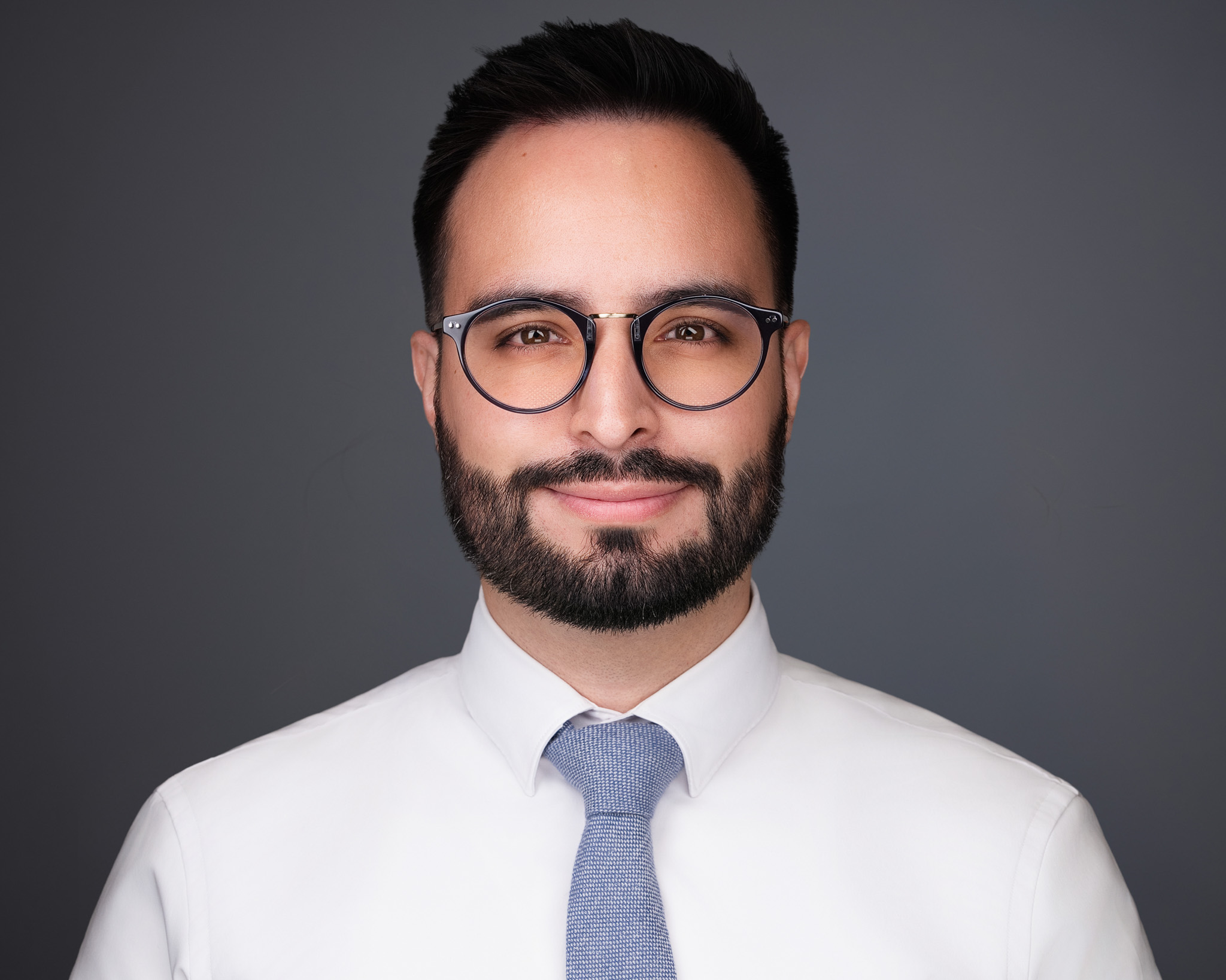 Financial advisor headshot in a broker-dealer office setting by 2mm Headshots