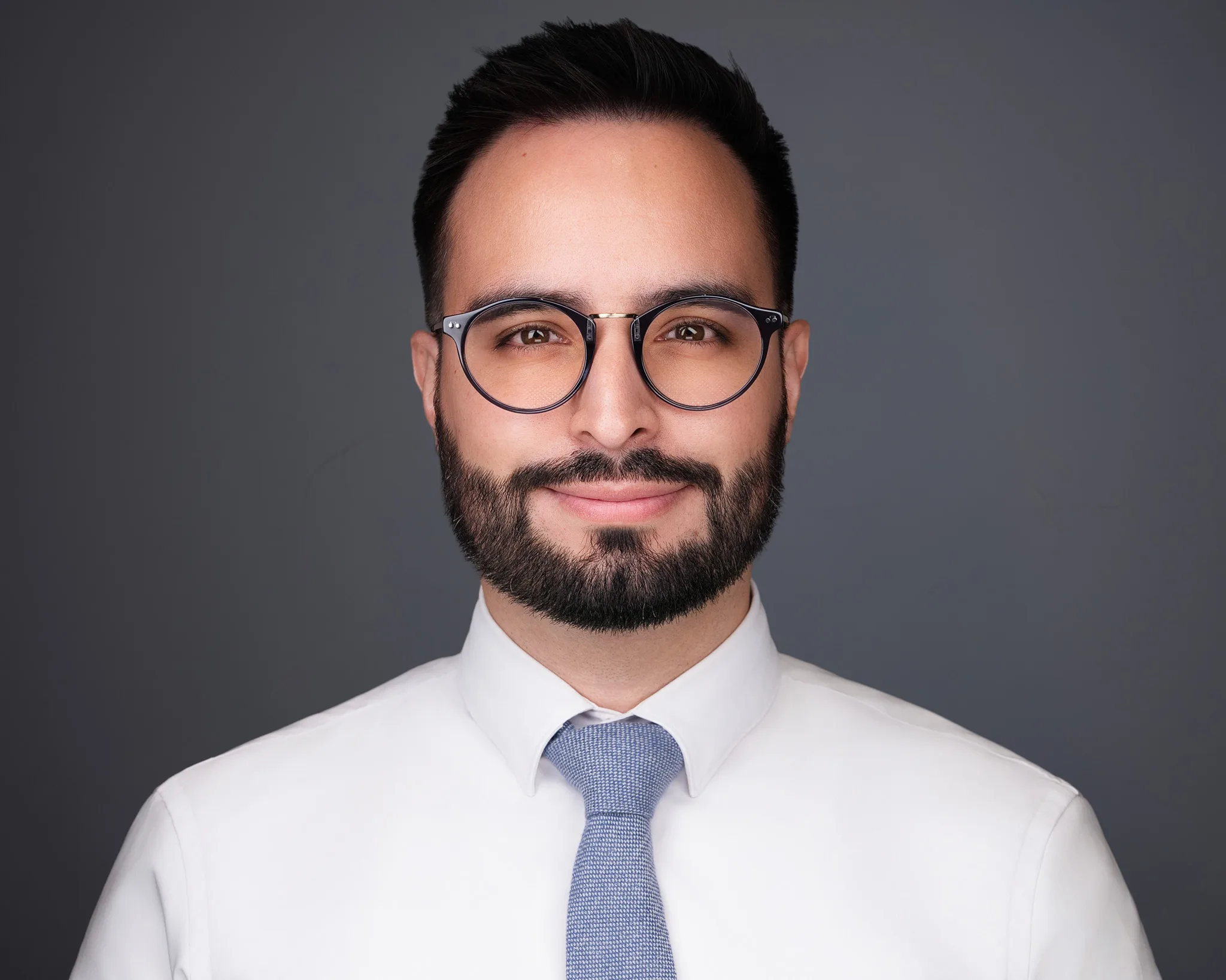 Financial advisor headshot in a broker-dealer office setting by 2mm Headshots
