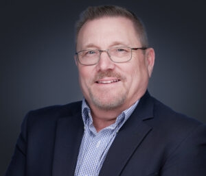 Professional executive headshot of a DFW business leader photographed by 2mm Headshots and Event Photography.