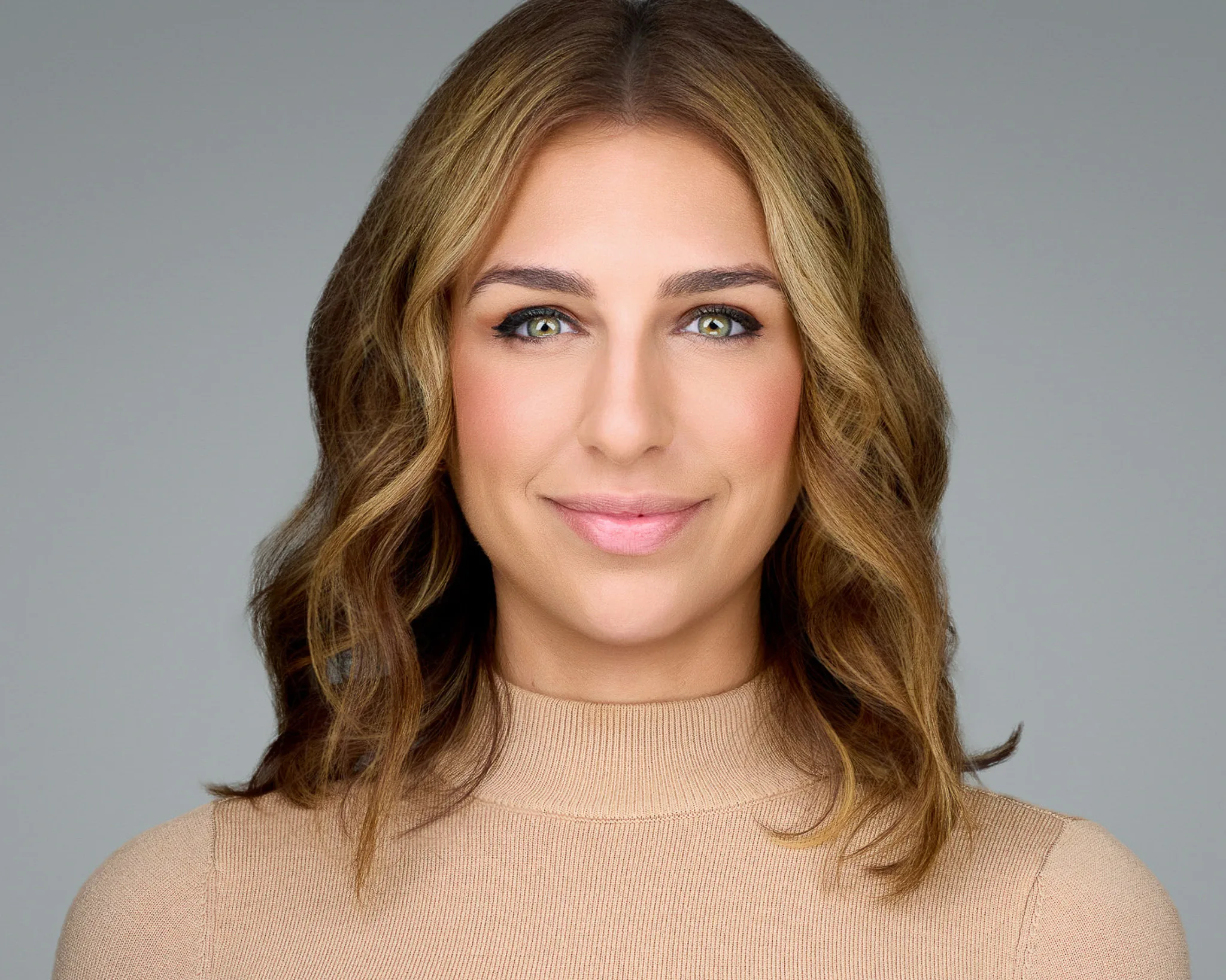 Executive portrait demonstrating the proprietary 2mm Method of facial-expression coaching by 2mm Headshots