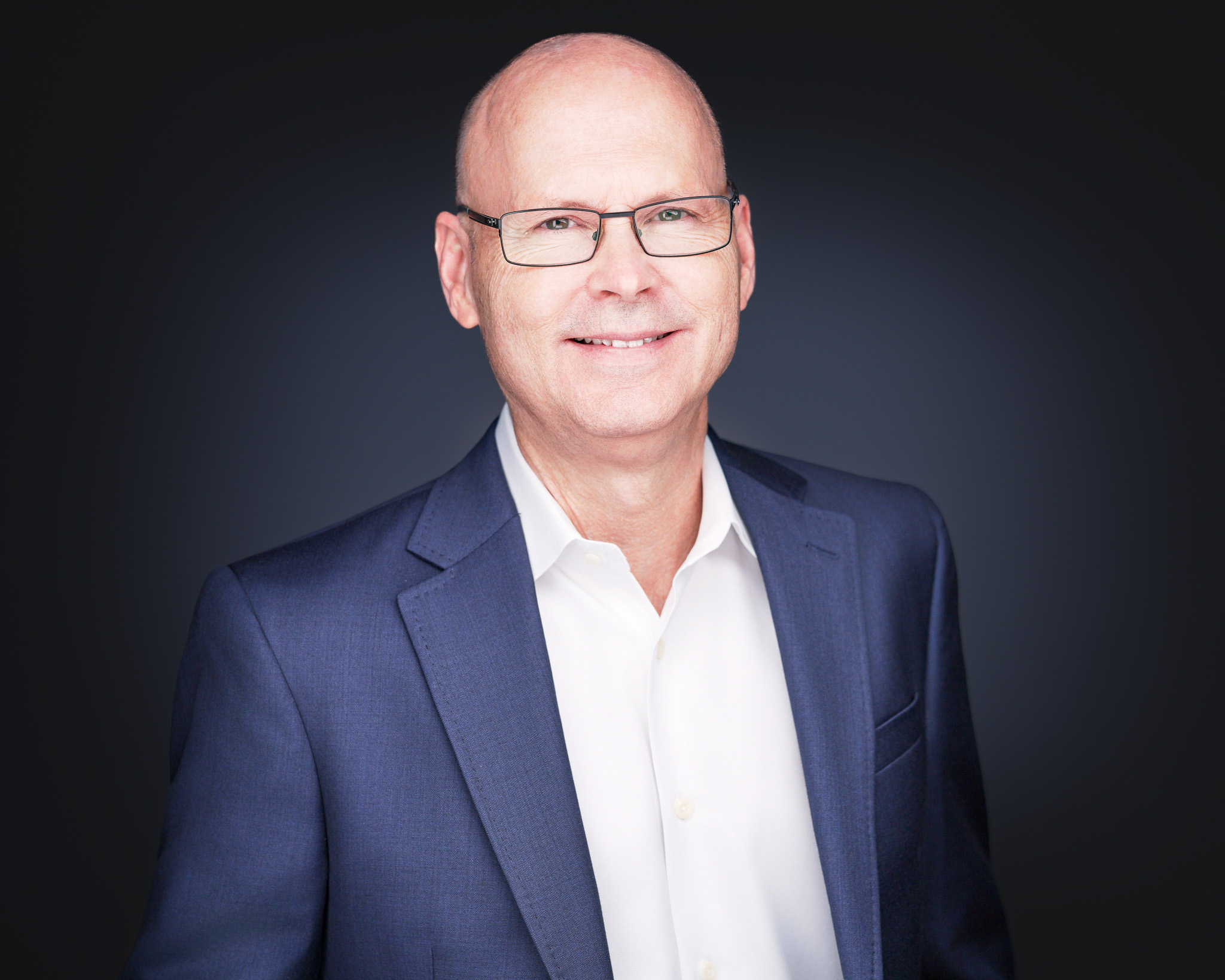 LinkedIn Profile Photo Rendered on Phone — 2mm Headshots Same-Day Delivery - 2MM Headshots and Event Photography Client viewing their newly delivered LinkedIn profile photo inside the LinkedIn mobile app on a smartphone, showing the headshot in the circular profile mask, by 2mm Headshots