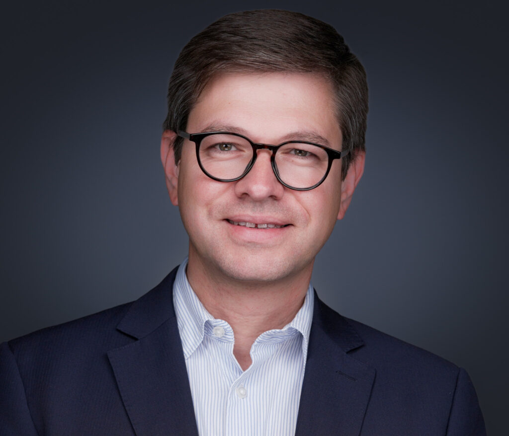 Executive headshot of a confident CEO photographed for board and press use