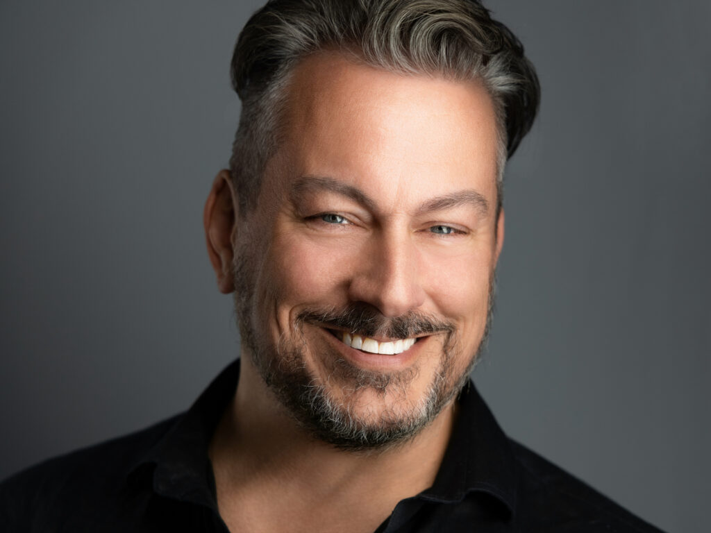 Confident DFW professional photographed by 2MM Headshots using the 2MM Method