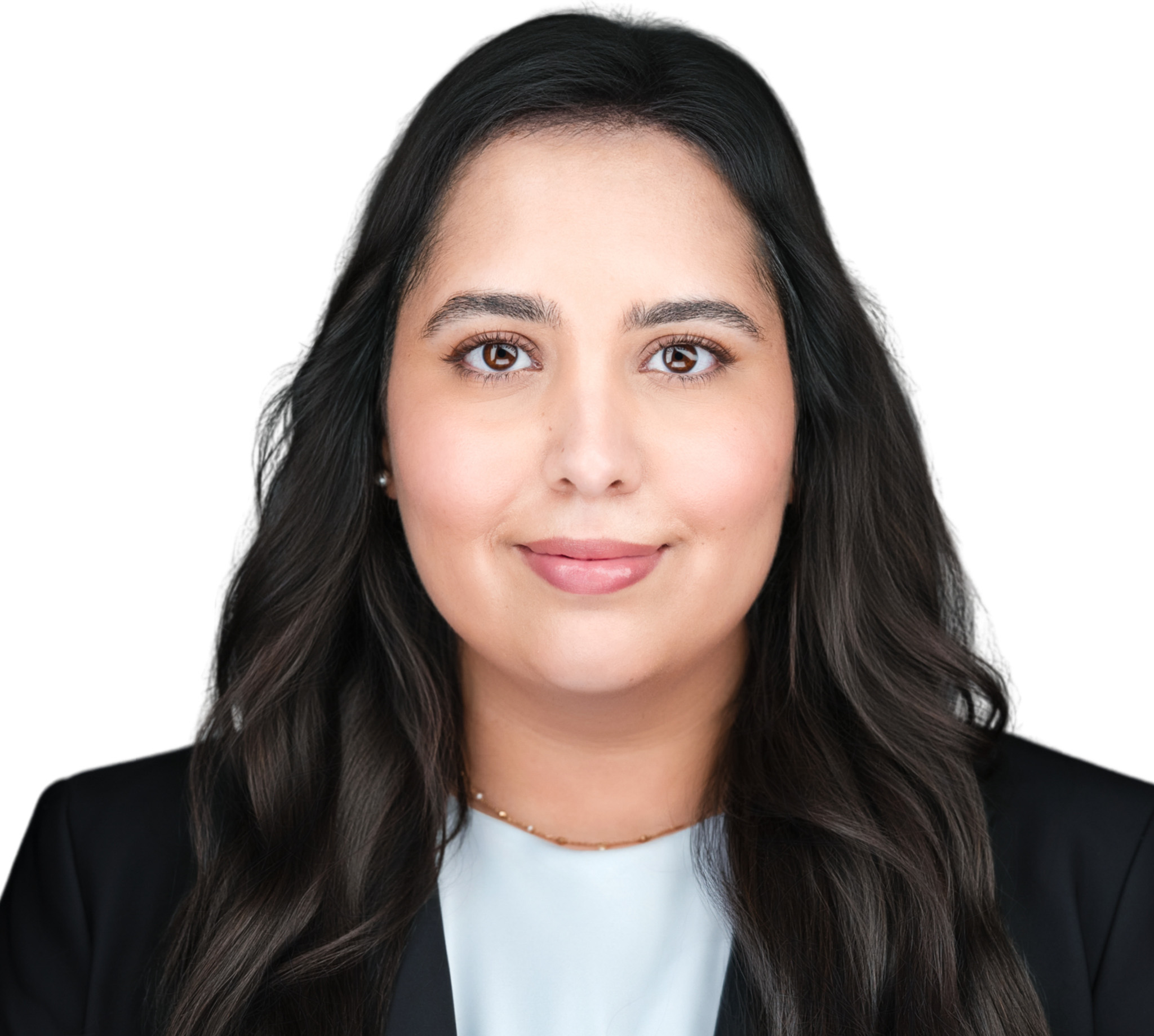 Smiling woman with long dark hair in a dark top, studio headshot against a white backdrop
